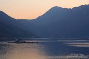 Travel photography:The islands of Sv. Djordje (St. George) and Gospa od Škrpjela (Our Lady of the Rock) within Boka Kotorska at dusk, Montenegro