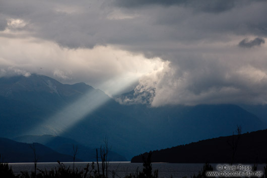 A ray of light breaks trough the clouds in Fiordland National Park
