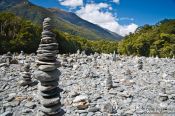 Travel photography:Stone pyramids in a river bed in Mount Aspiring National Park, New Zealand