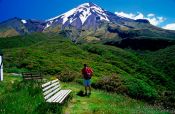 Travel photography:Hiker with Mt Taranaki, New Zealand