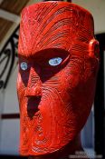 Travel photography:Wooden sculpture at a Maori meeting house near Whanganui, New Zealand