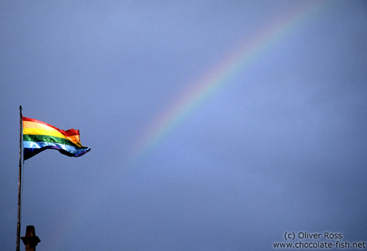 The rainbow flag over Cusco with real rainbow