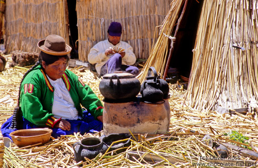 Uros woman cooking