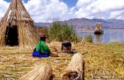 Travel photography:Uros woman cooking, Peru