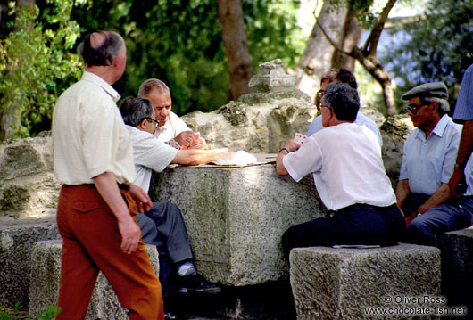 Men Playing Cards in Lisbon`s São Jorge Castle