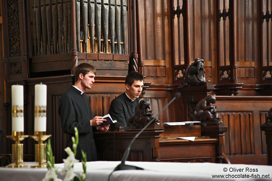 Priests rehearsing a song in Bratislava´s St. Martin´s cathedral