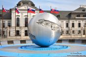Travel photography:Grassalkovich Palace with globe in Bratislava, Slovakia