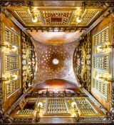 Travel photography:Looking up in the central hall of Palau Güell, Spain