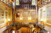 Travel photography:Interior windows facing the central hall in Palau Güell, Spain