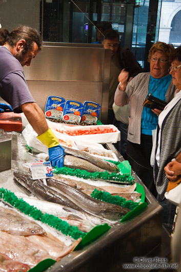 Fish vendor at the food market in Bilbao