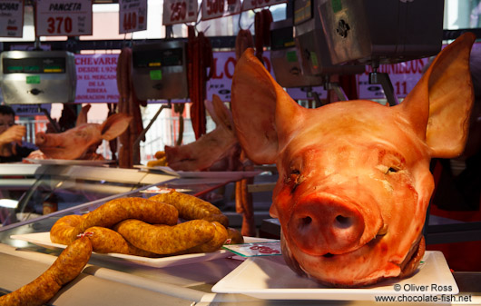 Pig´s heads and saussage for sale at the Bilbao food market
