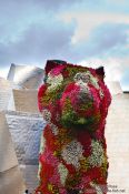 Travel photography:The Jeff Koons Dog sculpture outside the Bilbao Guggenheim Museum, Spain