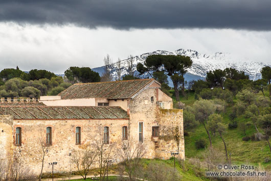 Snow capped mountains provide the natural backdrop to Segovia