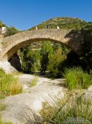 Travel photography:Old stone bridge at Cingles de Berti, Spain
