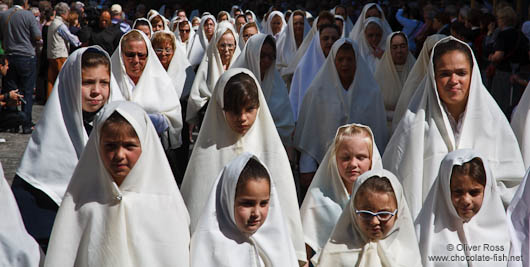 Girls and women duiring the Good Friday procession in Las Palmas