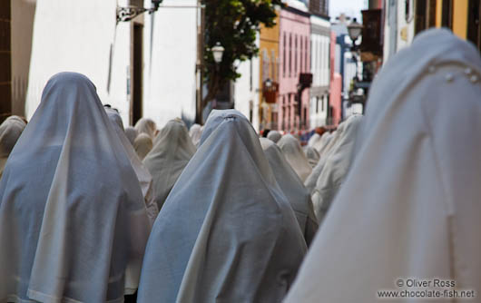 White head scarfs worn by women during the Good Friday procession in Las Palmas