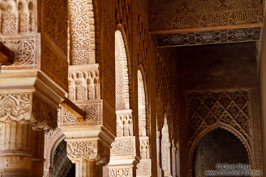 Arches in the Patio de los Leones (Court of the Lions) of the Nazrin palace in the Granada Alhambra