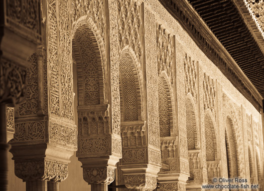 Arches in the Patio de los Leones (Court of the Lions) of the Nazrin palace in the Granada Alhambra