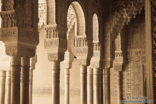 Arches in the Patio de los Leones (Court of the Lions) of the Nazrin palace in the Granada Alhambra