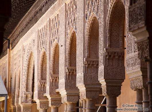 Arches in the Patio de los Leones (Court of the Lions) of the Nazrin palace in the Granada Alhambra