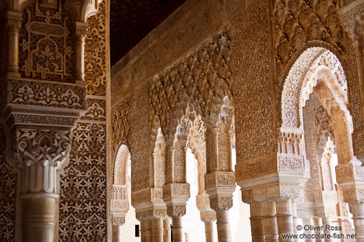 Arches in the Patio de los Leones (Court of the Lions) of the Nazrin palace in the Granada Alhambra