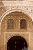 Travel photography:Arabesque facade detail in the Nazrin palace in the Granada Alhambra, Spain