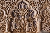 Travel photography:Arabesque facade detail in the Nazrin palace in the Granada Alhambra, Spain