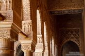 Travel photography:Arches in the Patio de los Leones (Court of the Lions) of the Nazrin palace in the Granada Alhambra, Spain