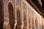 Travel photography:Arches in the Patio de los Leones (Court of the Lions) of the Nazrin palace in the Granada Alhambra, Spain