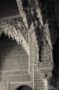 Travel photography:Arches in the Patio de los Leones (Court of the Lions) of the Nazrin palace in the Granada Alhambra, Spain