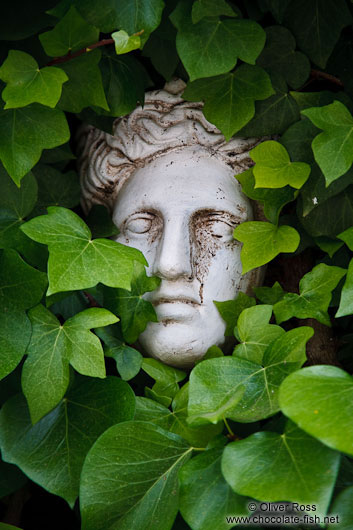 Overgrown marble face outside the Valldemossa Cartuja Carthusian Monastery