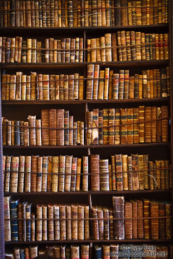Old library books in the Valldemossa Cartuja Carthusian monastery