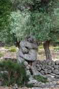 Travel photography:Human embrace sculpted by an olive tree near Son Marroig, Spain