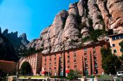 Travel photography:Montserrat main square and cerrated rock formations, Spain