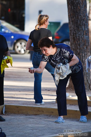 Woman playing boules in Palma