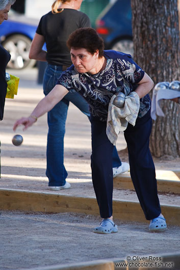 Woman playing boules in Palma