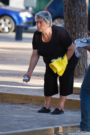 Woman playing boules in Palma