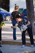 Travel photography:Woman playing boules in Palma, Spain