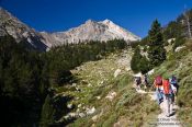 Travel photography:Hikers near the Pic de Bastiments, Spain