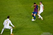 Travel photography:Tackle by Özil against Messi with Cristiano Ronaldo, Spain