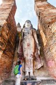 Travel photography:Giant Buddha at the Sukhothai temple complex, Thailand