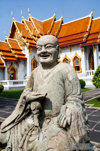 Buddha sculpture outside the marble temple Wat Benchamabophit in Bangkok