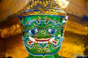 Travel photography:Golden demon sculpture at Wat Phra Kaew, the Bangkok Royal Palace, Thailand