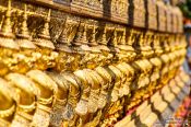 Travel photography:Golden Garuda sculptures at Wat Phra Kaew, the Bangkok Royal Palace, Thailand