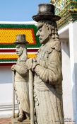 Travel photography:Stone guardians at Wat Pho temple in Bangkok, Thailand