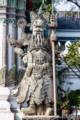 Travel photography:Stone guardian at Wat Pho temple in Bangkok, Thailand
