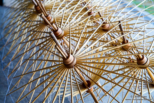 Finished wooden structures awaiting to receive their parasol cover at the Bo Sang parasol factory