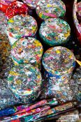 Travel photography:Paint pots used to hand colour the parasols at the Bo Sang parasol factory, Thailand