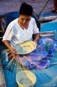Travel photography:Assembling a basket in Trang, Thailand