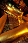 Travel photography:Giant reclining Buddha at Wat Pho, face detail., Thailand